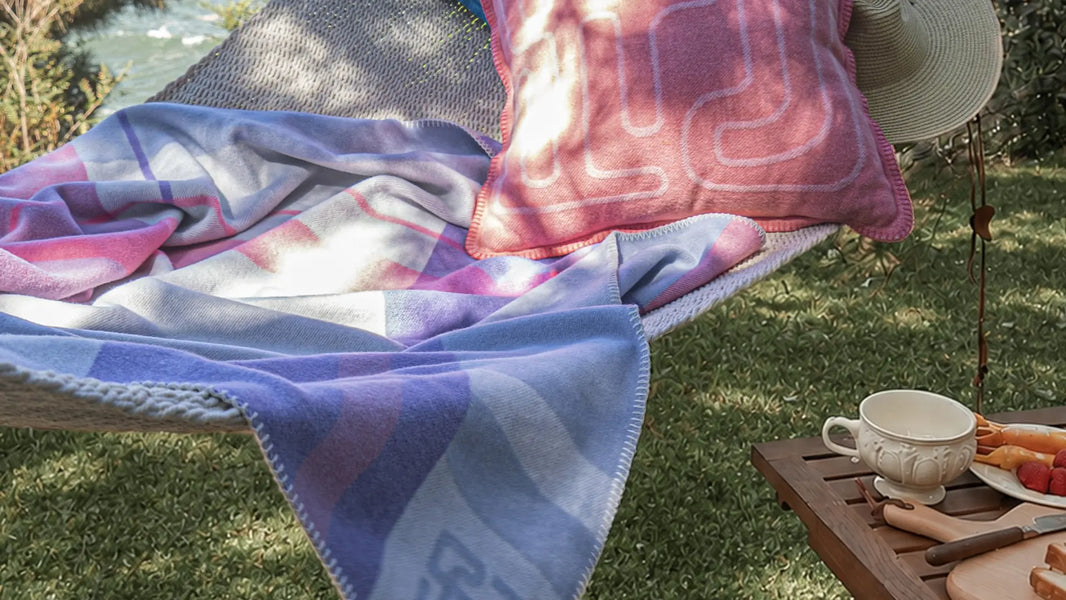 The Chroma Nomad: A Lambswool & Cashmere Plaid Throw Built for Wherever You Go